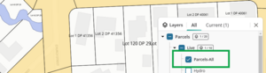 image highlighting the live parcels all layer ticked in the layer control panel, with the spatial map partly visible to show the parcels.