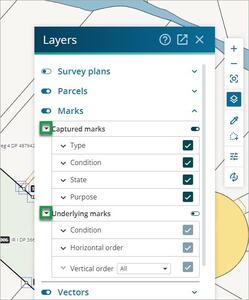 Layers panel in the Survey app. The arrow beside 'Captured marks' and the arrow beside 'Underlying marks' are highlighted.