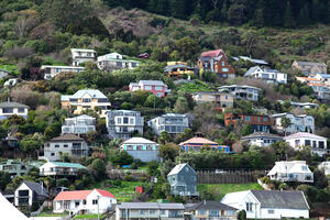 A group of houses perched on a hillside